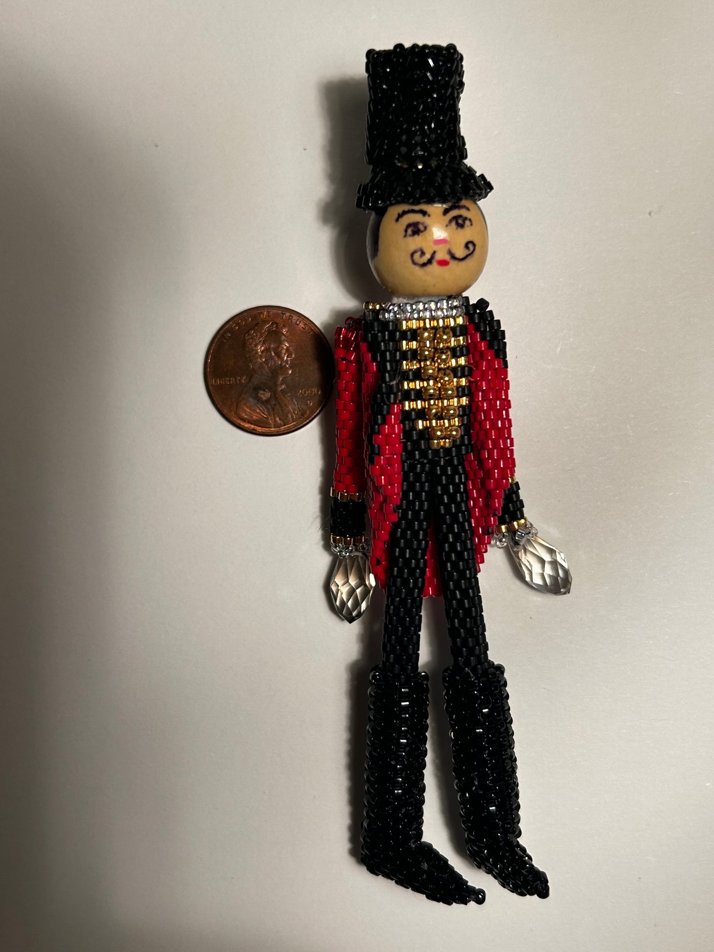 Beaded ringmaster pin