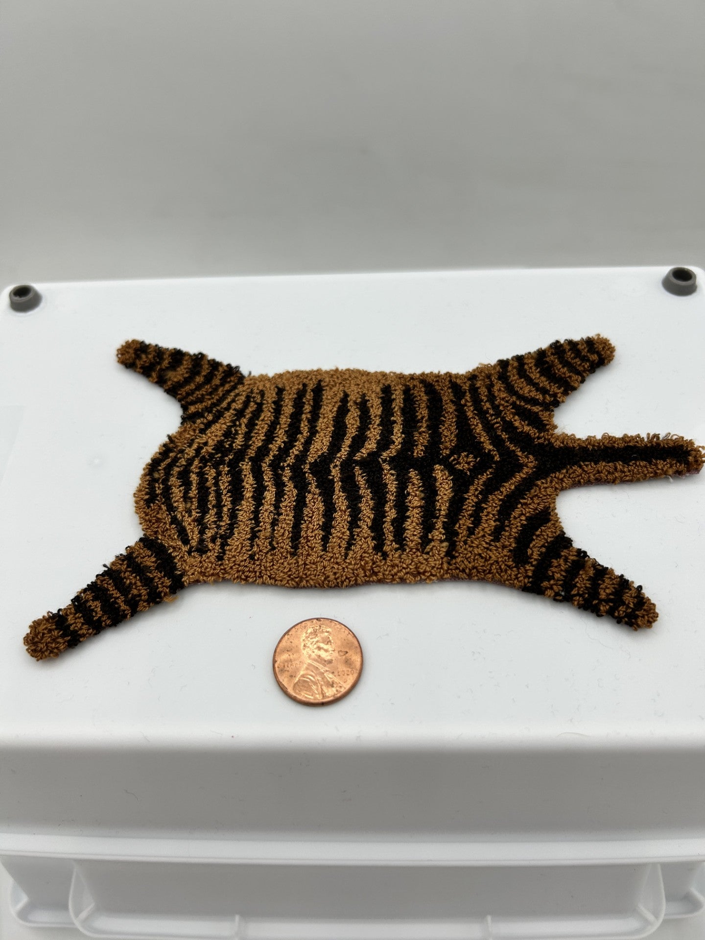 Miniature punch needle tiger rug